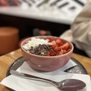 a bowl of fruit and yogurt