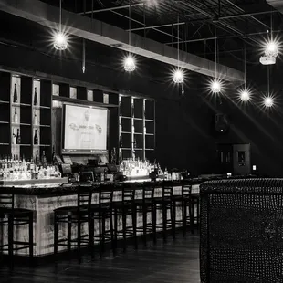black and white photograph of a bar