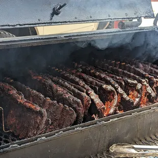 smoke coming out of the grill