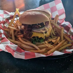 a burger and fries in a basket