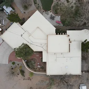 A residential roof beautifully transformed by Paramount&apos;s silicone roof coating.