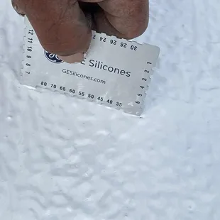 Work in progress photo of a silicone roof coating application, illustrating our meticulous process.