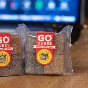 two bags of coffee on a table