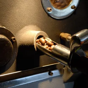 a person working on a coffee machine