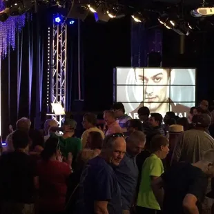 Audience coming in the paranormal showroom.