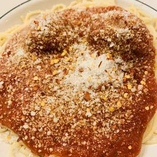 a plate of spaghetti with meatballs