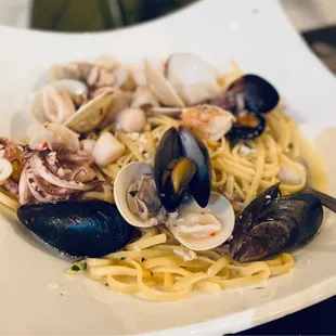 Seafood Fra Diavolo. The shrimp wasn't fully cooked. She sent it back.