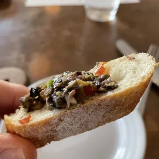 Complimentary Hot Artisan Bread &amp; Olive Tapenade tasted outstanding !