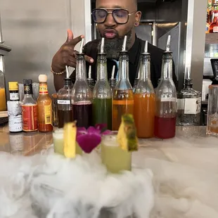 Bar area, specialty drink, bartender extraordinaire