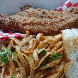 Cajun pasta with a little bread. I added a piece of fish.