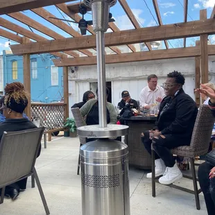 a group of people sitting outside