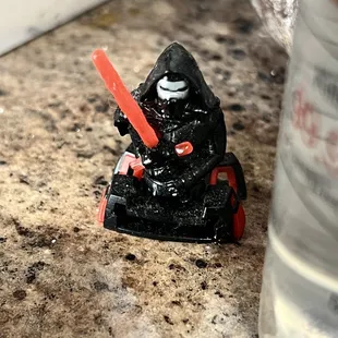 Kylo Ren figurine at the "bar" area
