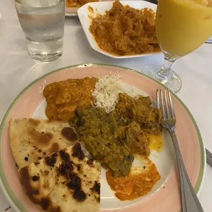 Mango smoothie, garlic naan, Chicken Makhani