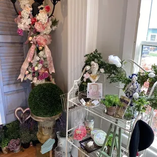a display of flowers and decorations