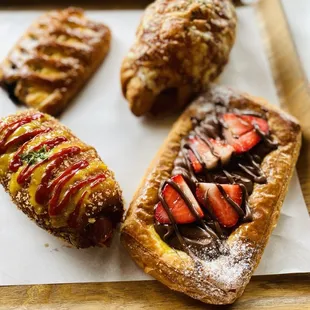 Blueberry cheesecake pastry, Ham and Cheese croissant, Sweet Hot Dog, and that delicious Nutella Strawberry pastry. Mmm