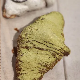two pastries on a cutting board