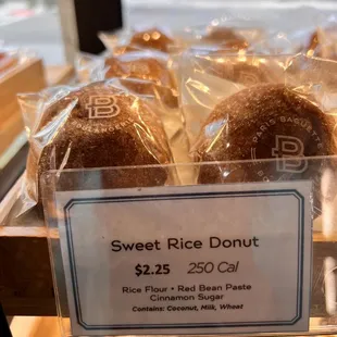 a display case of sweet rice donuts