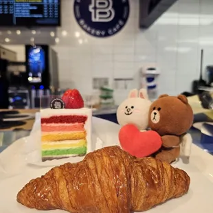 Instead of paying $8.45 for the Rainbow Cake slice, I paid $3 because of the promotion on the app... with any purchase. We got a croissant!