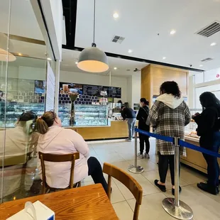 a group of people at a counter