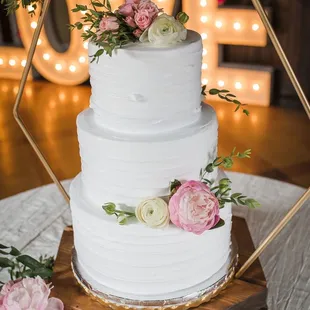 3 tier wedding cake (2 layer pandan coconut, 1 layer strawberry shortcake), Photo by: Ashley Rutland Photography