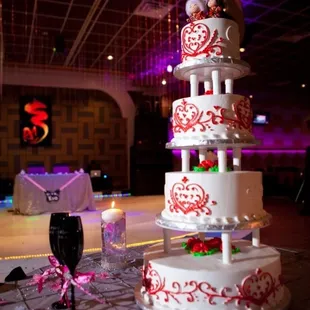 My wedding cake! Exactly how I envisioned it! Alternating flavors of mocha rum and strawberry shortcake!