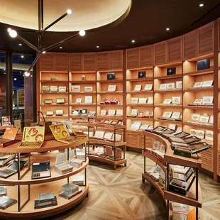 Climate controlled humidor featuring custom Spanish cedar shelving with more than 300 cigar brands.