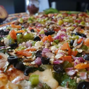 Vegeterian Pizza (spinash,mushroom, bel pepper, onions, tomatos, fetta cheese, mozarella cheese)