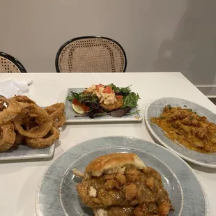 Onion rings, fried green tomatoes &amp; Lump crabmeat remoulade sauce &amp; catfish Acadia biscuit &amp; crawfish enchiladas
