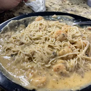 Shrimp and Angel hair pasta in an awesome cream sauce!