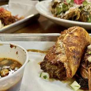 Birria tacos...check out that cheese layer!