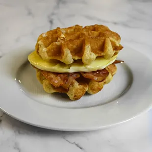 Bacon, egg, and cheese waffle sandwich