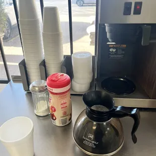 Coffee, not sure what type it is. $1.50 per cup, expensive. I don&apos;t know if it decaf or Folgers or what...