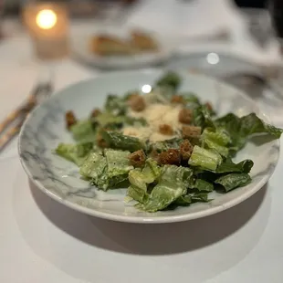 a plate of salad on a table