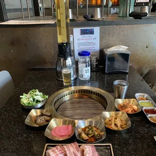 Pork belly and side dishes with 80oz somaek (soju + beer) tower