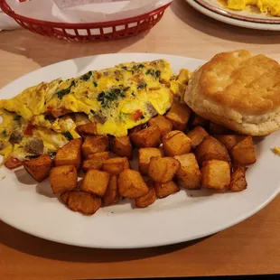 Mediterranean omelet with potatoes and biscuit