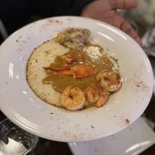 Seafood and grits (shrimp, lobster and crab)