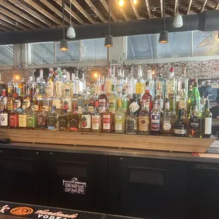 Wall of liquor bottles.