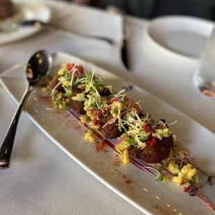 Crab cakes cut in four