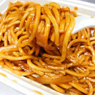 Traditional yock noodle cooked with homemade sauce, ketchup, onion, a boiled egg, and the meat you choose.
