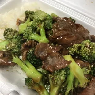 Beef and broccoli over white rice