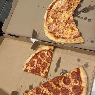 two slices of pepperoni pizza
