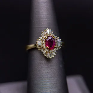 Ruby ring, set in 18K with G Vs2 baguettes and round Diamonds