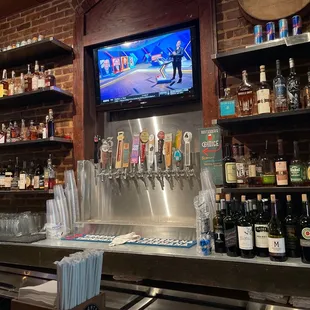 beer taps and a flat screen tv