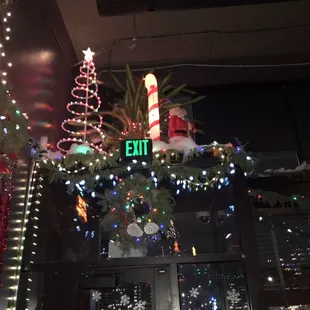 christmas decorations and a lit candle
