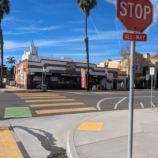 a stop sign on the corner