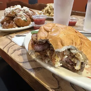 Glenview burger with garlic onion rings and garlic fries.