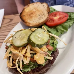 VEGAN RAMIREZ Impossible patty, lettuce, tomatoes, vegan aioli and bun. With made pico de gallo, crispy tortilla chips, house guacamole