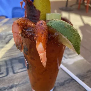 Fully loaded Bloody Mary...was too much seasoning on rim and shrimp but delicious Mary!!