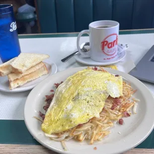 an omelet and toast on a plate