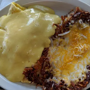 Omelette with hollandaise sauce with side of cheesy hash browns